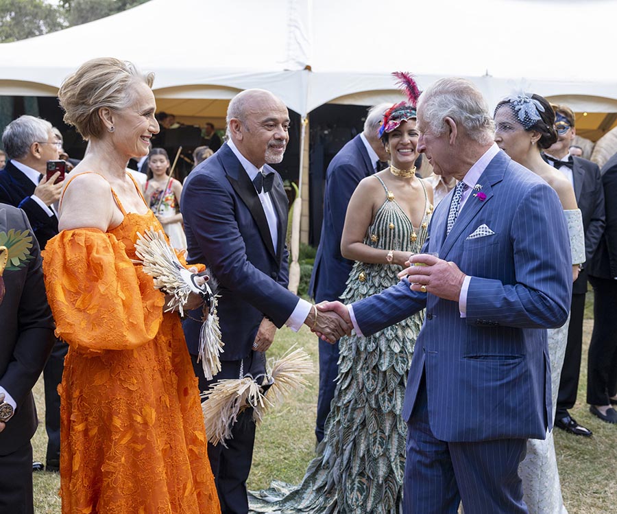 Kung Charles och Camilla på kändiskalas med tv-stjärna